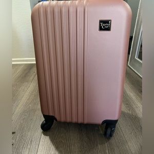 Pink carryon luggage